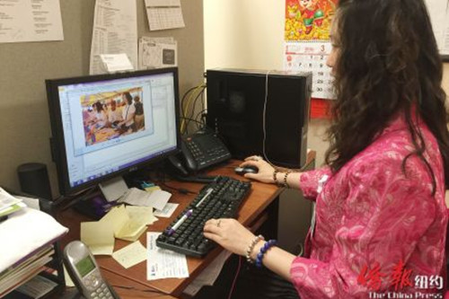 羅潔在工作中。(僑報(bào)記者崔國(guó)萁攝)