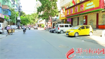 吉怡路與吉春路交界處，流動攤檔和各式遮陽物被清走后，顯得明亮整潔。