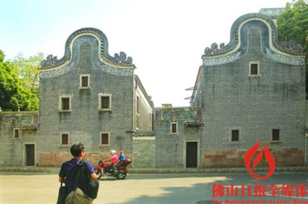 從九江人民路看過去，吳家大院古韻猶存。