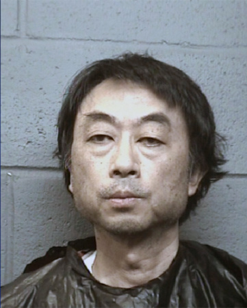 警方在兇案現(xiàn)場搜證將近長達(dá)10小時(shí)，圖為段志彬。（美國《世界日報(bào)》）