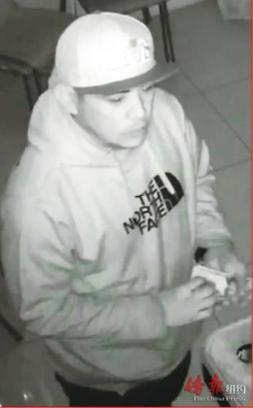搶劫推拿店的嫌疑人之一。（美國(guó)《僑報(bào)》）