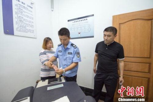 胡某霞依法歸案。 杭州警方供圖