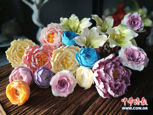 這才叫真正的“妙手生花”。（希臘《中希時(shí)報(bào)》）