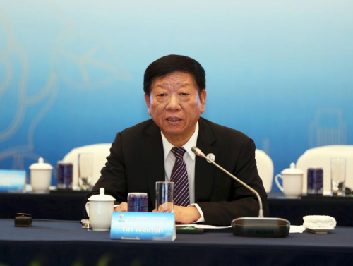 圖為人力資源和社會保障部部長尹蔚民致辭。主辦方供圖