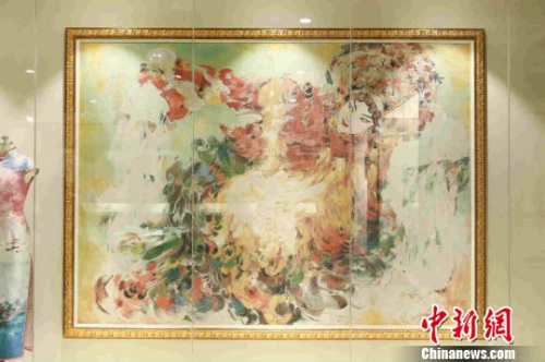 展品——大型仿油畫彩色織錦《金貴妃》?！堦牢?攝