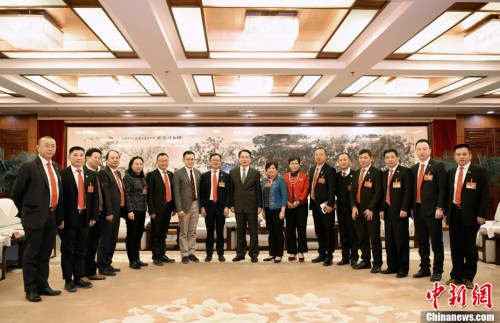 11月29日，國務(wù)院僑辦副主任譚天星在北京會見孟加拉國華僑華人聯(lián)合會訪華團(tuán)。<a target='_blank' >中新社</a>記者 張勤 攝