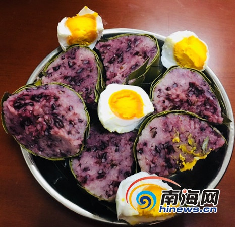 萬寧的“落”，是古萬州人對“用鳳尾草織成囊，裝米煮熟”的一種小吃的俗稱。萬寧市供圖