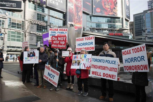 華人走上多倫多街頭游行。(加拿大環(huán)球華語電視臺供圖)