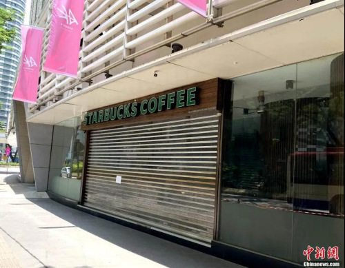 資料圖：實(shí)施“行動(dòng)管制令”首日，馬來西亞不少商場、餐館都關(guān)門謝客。陳悅 攝