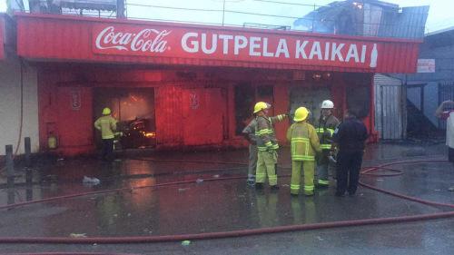 中國僑網受災華人商店。(巴新華助中心供圖)