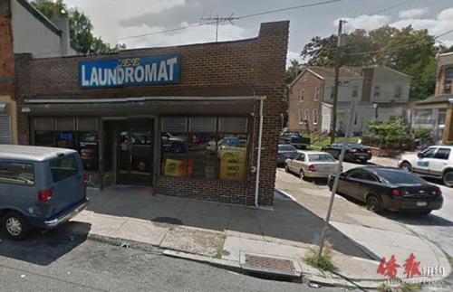 中國僑網(wǎng)被劫洗衣店的外部景觀。(美國《僑報(bào)》)