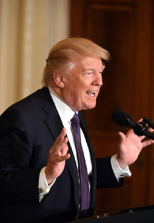 中國(guó)僑網(wǎng)資料圖片:美國(guó)總統(tǒng)特朗普 新華社記者殷博古攝