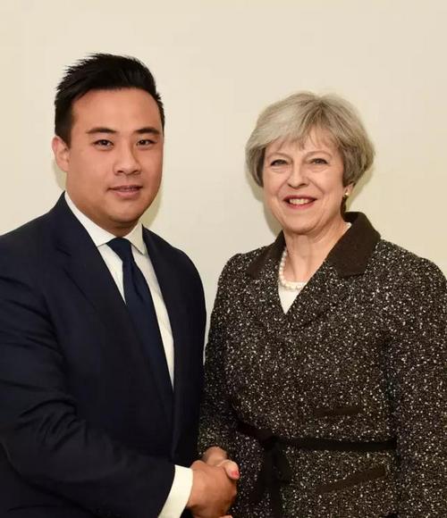 中國僑網(wǎng)黃精明與特雷莎·梅