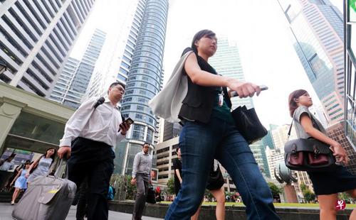 中國僑網(wǎng)本地人就業(yè)人數(shù)則預計增加21300人或0.9%,比前年增加的11200人多出將近一倍。(新加坡《聯(lián)合早報》檔案照)