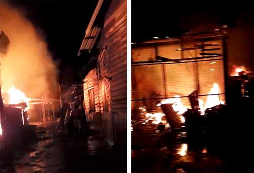 中國(guó)僑網(wǎng)3間店屋陷入熊熊大火之中。(馬來(lái)西亞《光華日?qǐng)?bào)》)