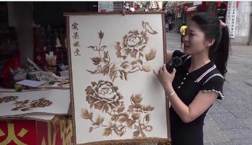 中國僑網(wǎng)洛陽火燒畫(圖片來源:中國華文教育基金會)