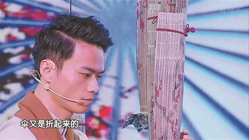 中國僑網(wǎng)蘇澤河辨認紙傘上的線索