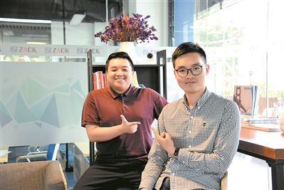 中國(guó)僑網(wǎng)陳志聰(圖右)和梁珩