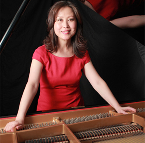 中國(guó)僑網(wǎng)鋼琴家王濱近照。(法國(guó)《歐洲時(shí)報(bào)》/黃冠杰 攝)