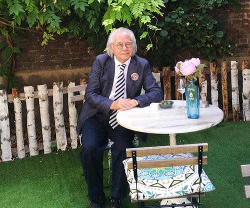 中國僑網(wǎng)圖為林祥雄在比利時接受媒體采訪。(法國《歐洲時報》/孔帆 攝)